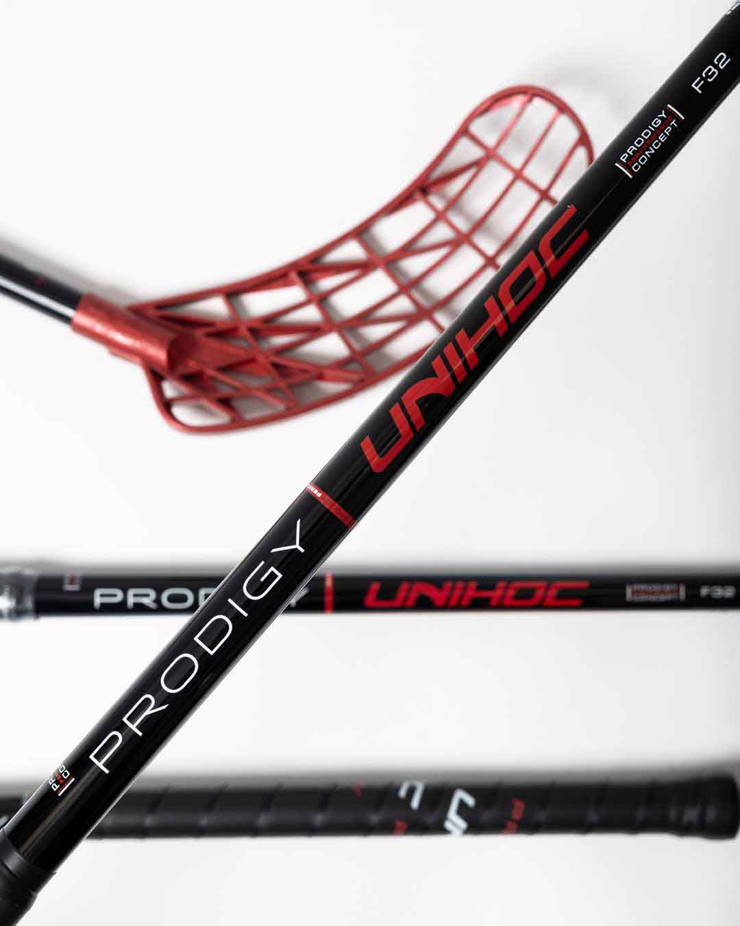 STICK UNILITE PRODIGY 32 BLACK/RADIANT RED